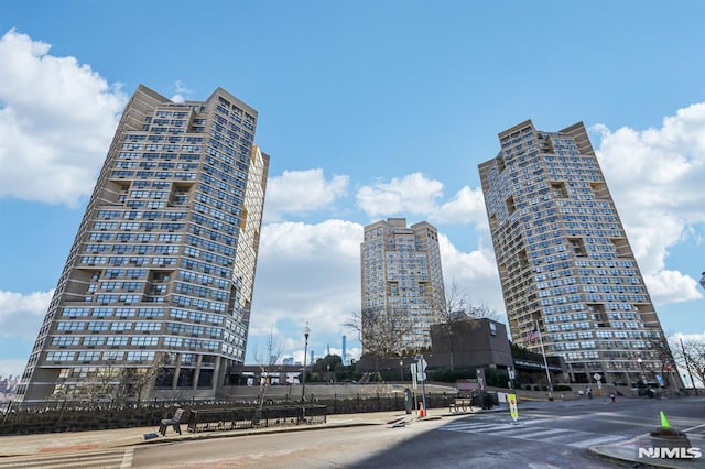 view of building exterior featuring a view of city