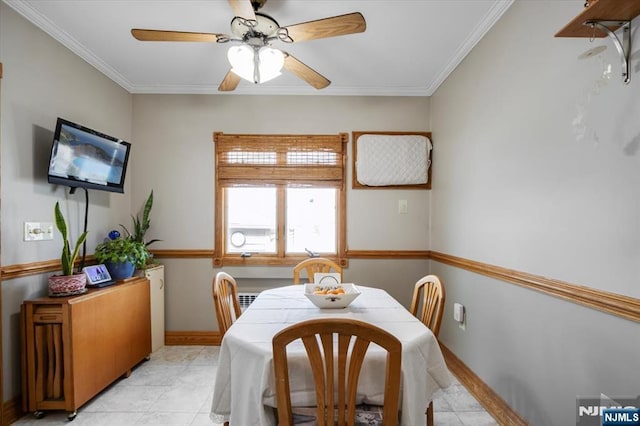 dining area featuring baseboards, ceiling fan, light tile patterned floors, and crown molding