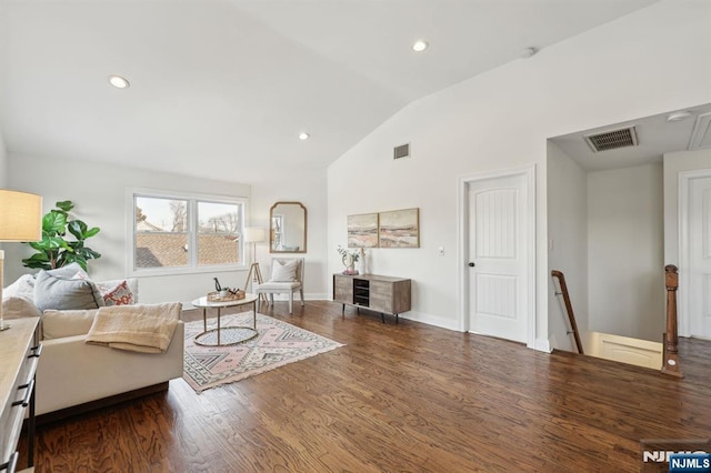 living room with lofted ceiling, visible vents, wood finished floors, and recessed lighting