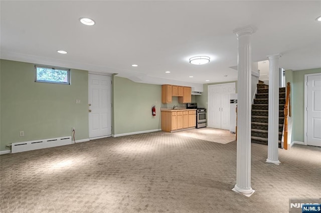 unfurnished living room featuring light carpet, stairway, baseboard heating, and recessed lighting