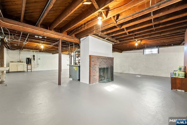 basement with a fireplace