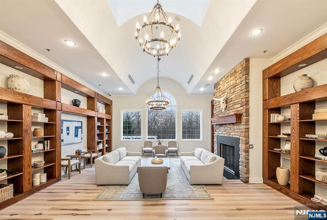 living room with a chandelier, recessed lighting, built in features, vaulted ceiling, and light wood finished floors