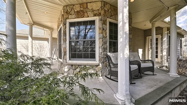 view of patio featuring covered porch