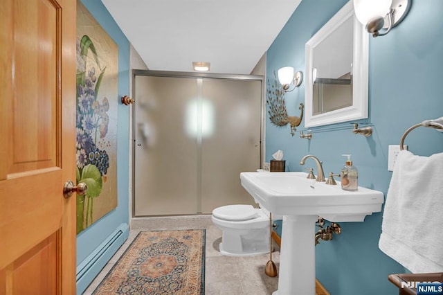 full bathroom with a baseboard heating unit, a stall shower, toilet, and tile patterned floors