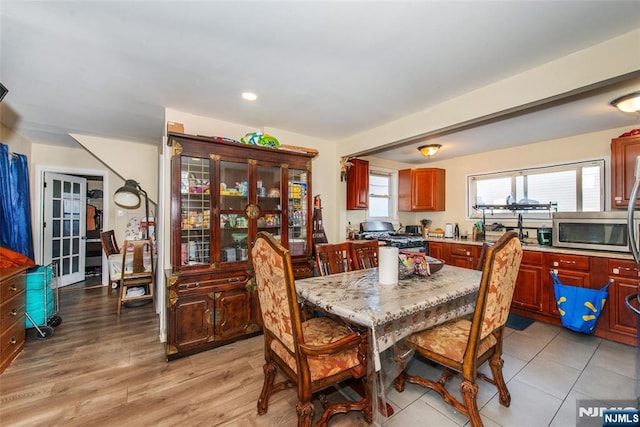 dining room with light wood finished floors