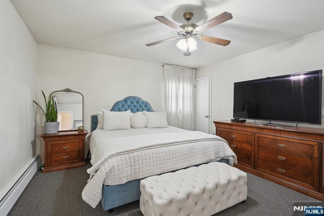 bedroom featuring dark carpet, baseboard heating, and a ceiling fan