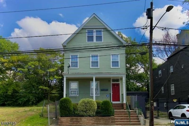 view of front of house with covered porch