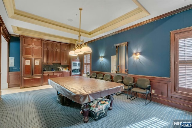 playroom with carpet, a raised ceiling, wainscoting, and billiards