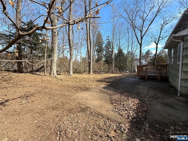 view of yard featuring a deck