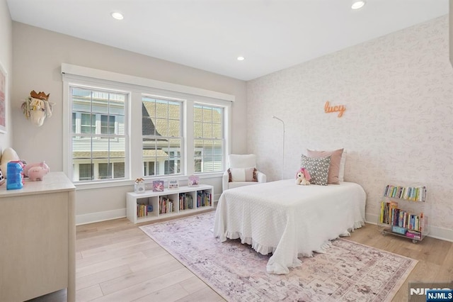 bedroom featuring wallpapered walls, baseboards, light wood-style floors, and recessed lighting