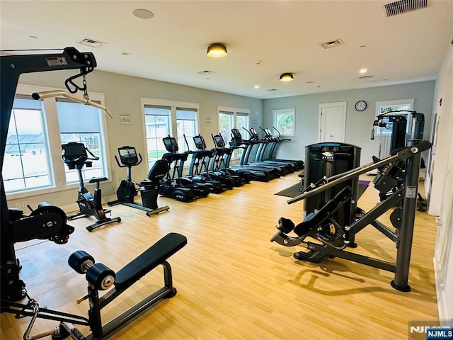 gym with visible vents and wood finished floors