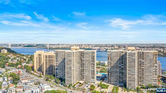 aerial view featuring a view of city and a water view