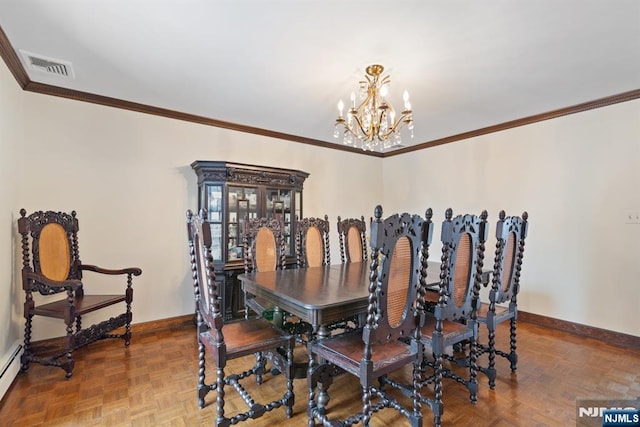 dining area with visible vents, crown molding, baseboards, and an inviting chandelier