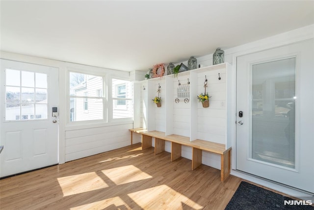 mudroom with light wood finished floors