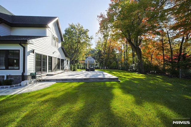 view of yard with a patio