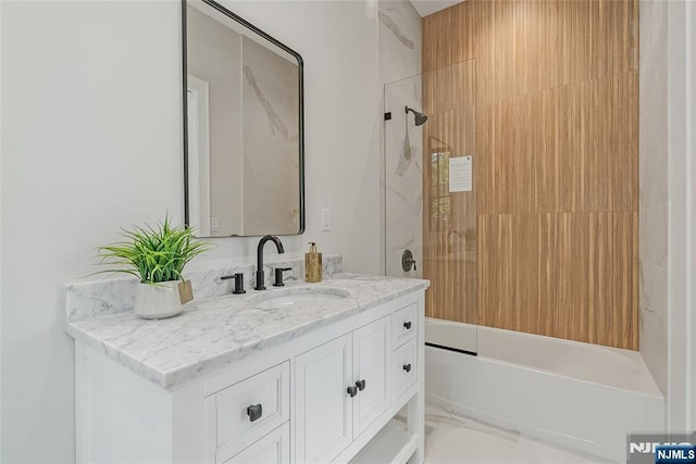 full bath with bathing tub / shower combination and vanity