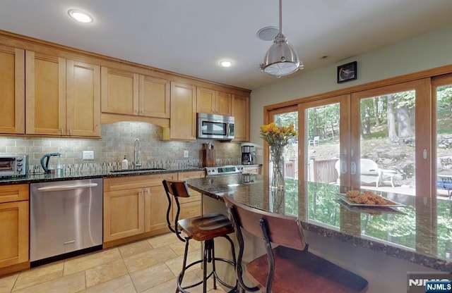 30 Brookvale Rd, Kinnelon Borough, NJ 07405 - kitchen featuring stainless steel appliances, a sink, decorative backsplash, dark stone counters, and recessed lighting