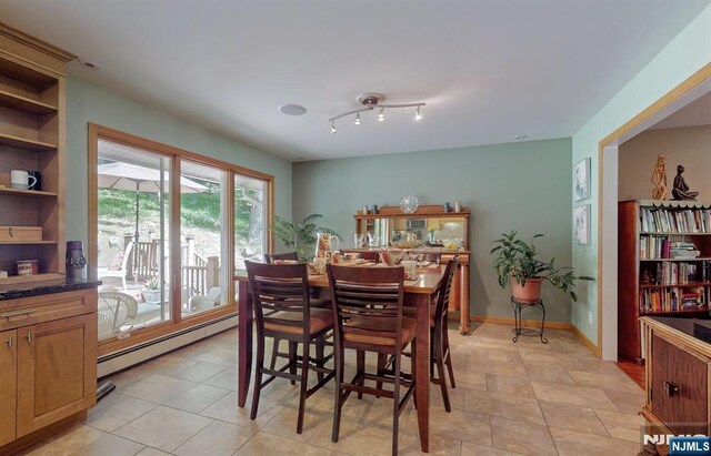 30 Brookvale Rd, Kinnelon Borough, NJ 07405 - dining space featuring a baseboard radiator and baseboards