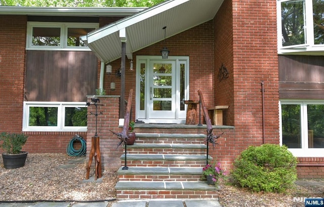 30 Brookvale Rd, Kinnelon Borough, NJ 07405 - view of exterior entry featuring brick siding