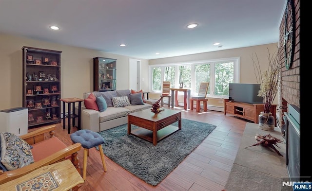30 Brookvale Rd, Kinnelon Borough, NJ 07405 - living room with recessed lighting, wood finished floors, and a brick fireplace