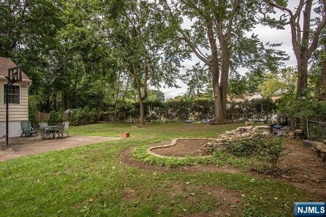 view of yard with a patio area and fence