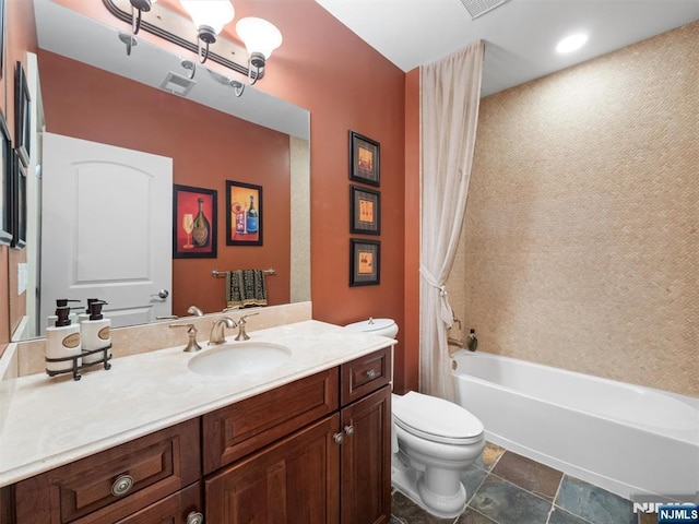 full bath featuring shower / bath combination with curtain, visible vents, vanity, and toilet