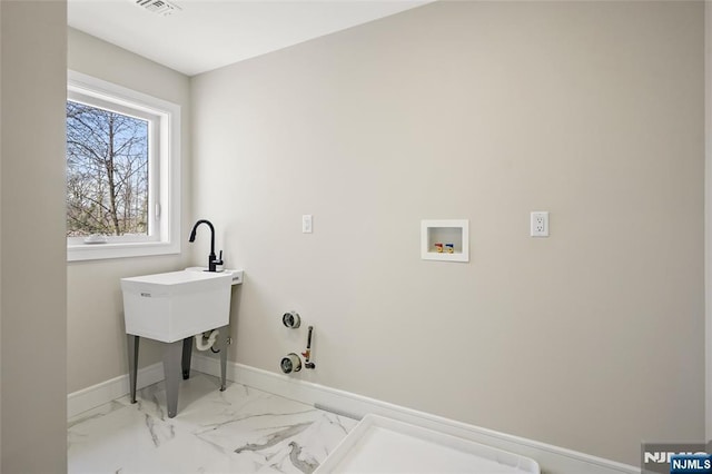 laundry area featuring hookup for a washing machine, laundry area, visible vents, baseboards, and marble finish floor