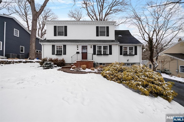 view of front of home featuring cooling unit