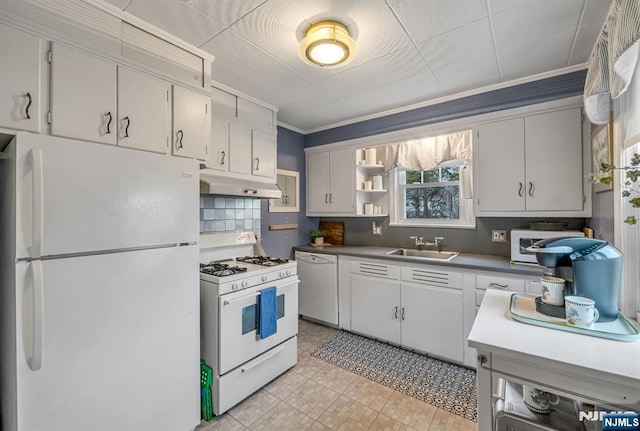 kitchen featuring white appliances, ornamental molding, under cabinet range hood, open shelves, and a sink