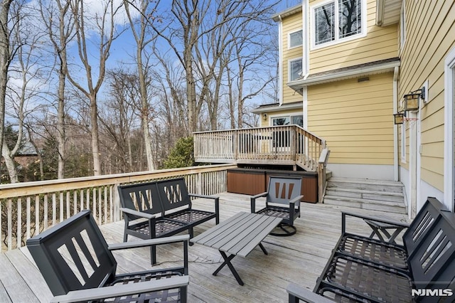 wooden terrace featuring an outdoor living space