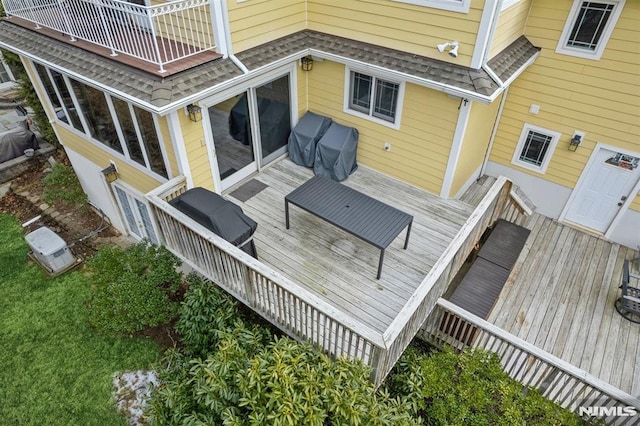 wooden deck with area for grilling