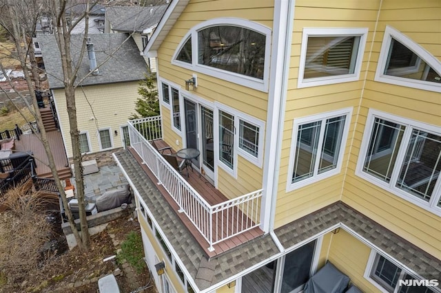 view of home's exterior featuring a balcony