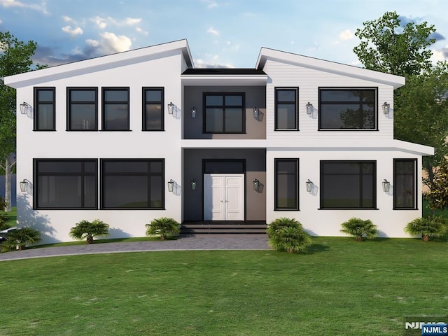 contemporary house with entry steps, a front yard, and stucco siding