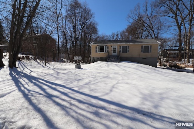 view of front of home with crawl space