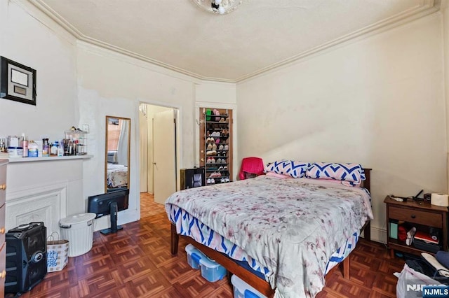 bedroom featuring ornamental molding