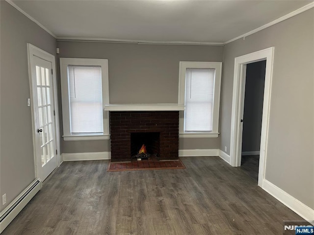 unfurnished living room featuring dark wood-type flooring, a baseboard radiator, a fireplace, and crown molding