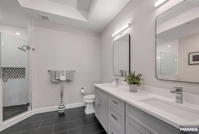 full bath with toilet, visible vents, a sink, and tile patterned floors