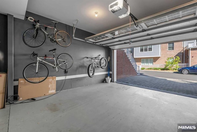 garage featuring a garage door opener