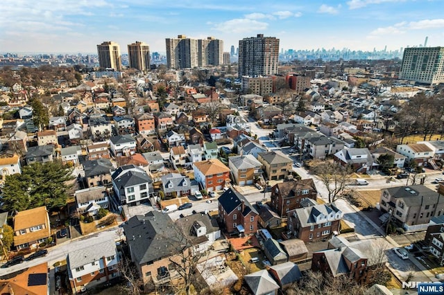 birds eye view of property with a city view