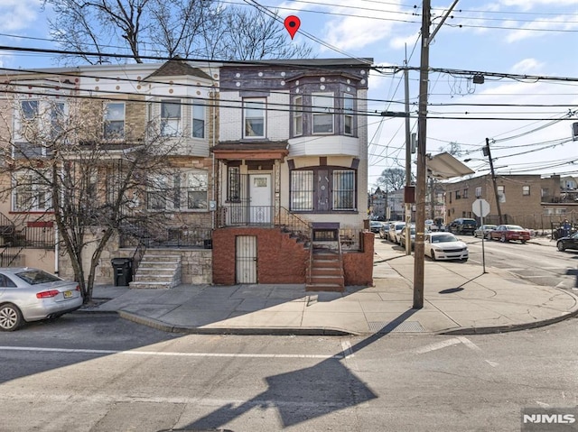 multi unit property featuring brick siding