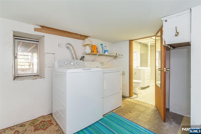 laundry area featuring laundry area and separate washer and dryer