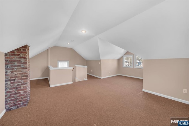 bonus room with lofted ceiling, baseboards, carpet flooring, and recessed lighting