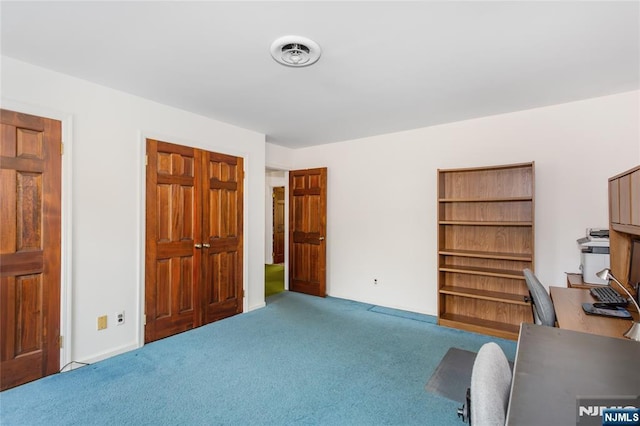 office space with carpet and visible vents