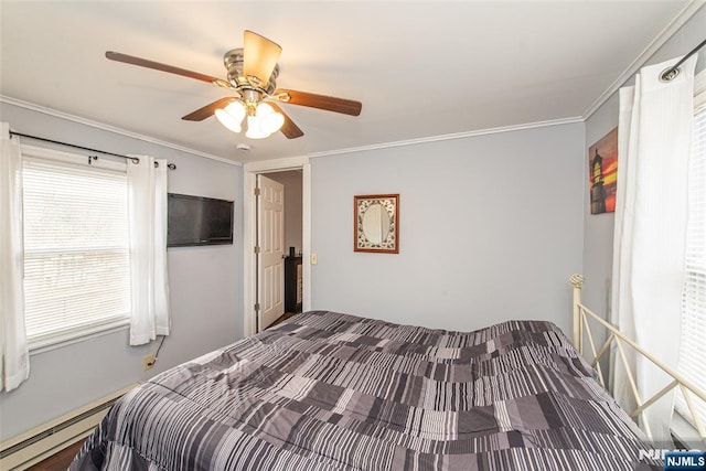 bedroom featuring a baseboard heating unit, ornamental molding, and a ceiling fan