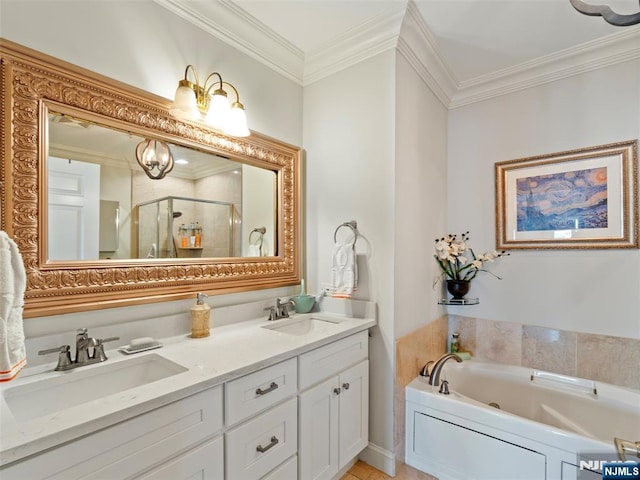 full bath featuring ornamental molding, a stall shower, and a sink