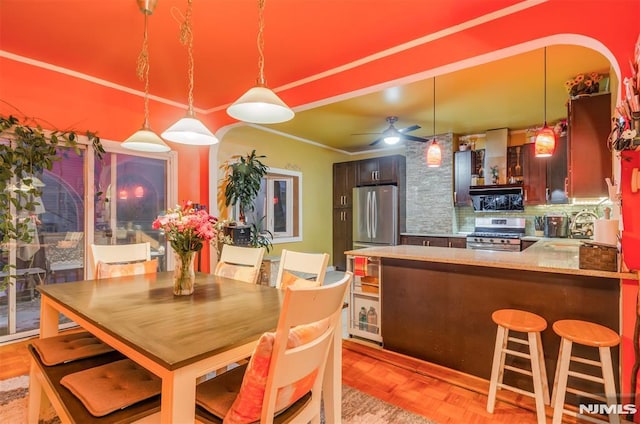 dining room with a ceiling fan