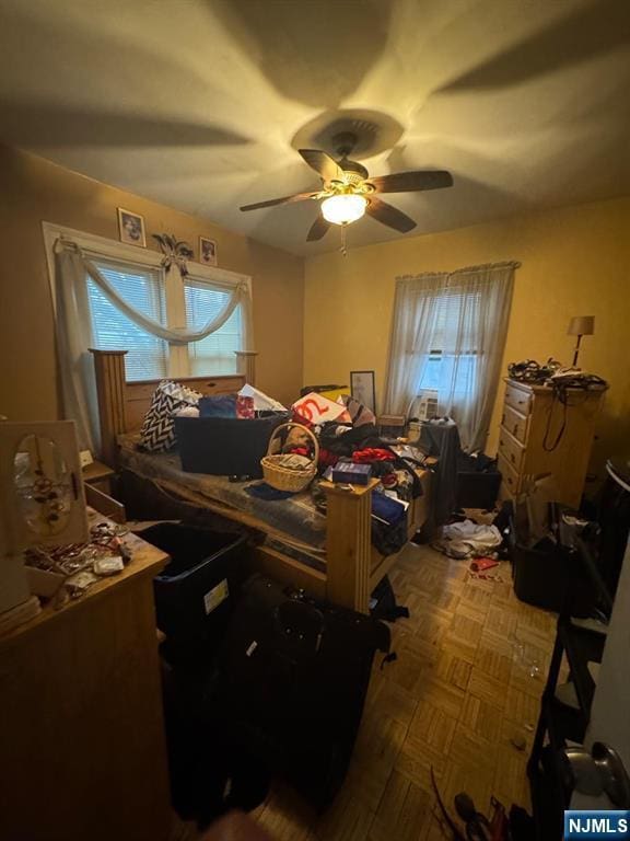 bedroom featuring ceiling fan