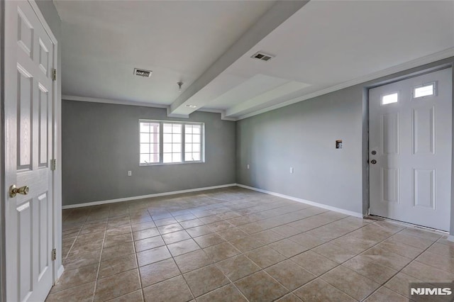 foyer featuring visible vents, baseboards, ornamental molding, beamed ceiling, and tile patterned floors