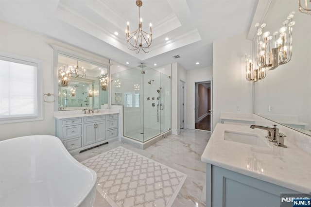 full bath with marble finish floor, visible vents, an inviting chandelier, a stall shower, and a sink