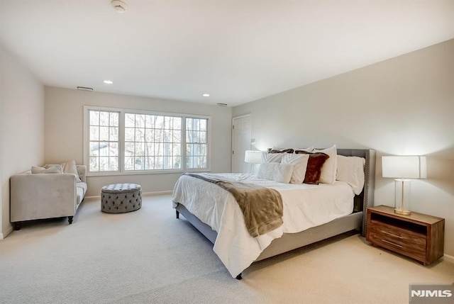 bedroom with light carpet, baseboards, and recessed lighting